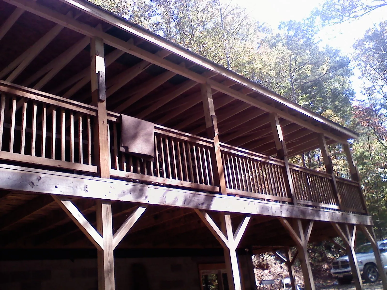 Timber framing under a new elevated porch and deck — Roof Leak Repair in Elm City by Roofing Brothers